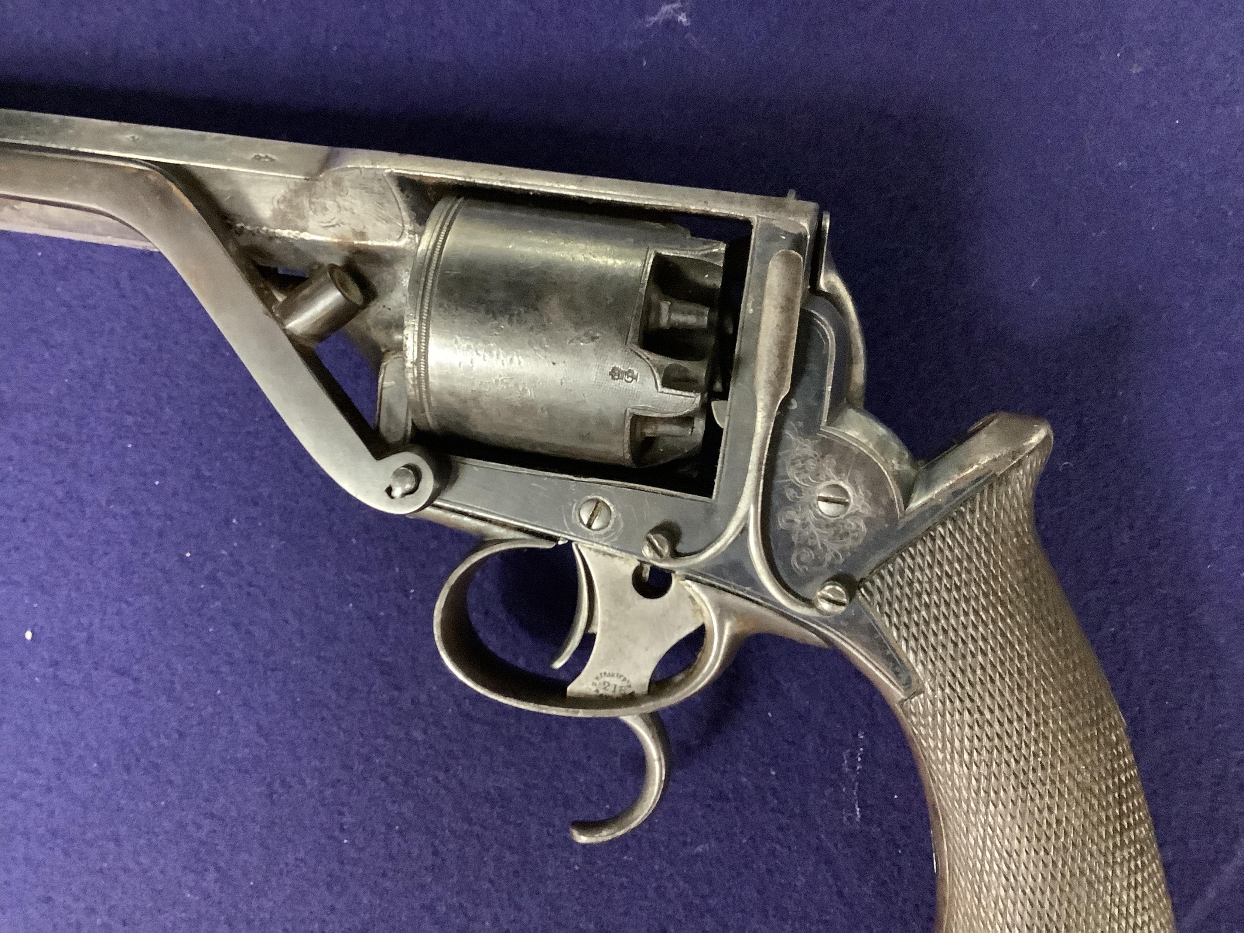 A scarce 36 bore 5 shot Tranter’s patent double trigger Dragoon percussion revolver retailed by T. Blissett, South Castle Street, Liverpool, number 2123, side lever detachable ramrod (replaced), foliate engraved frame, o